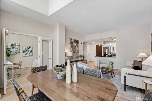 88 King St Unit 104, San Francisco, CA 94107 - dining space featuring baseboards and light wood-style floors