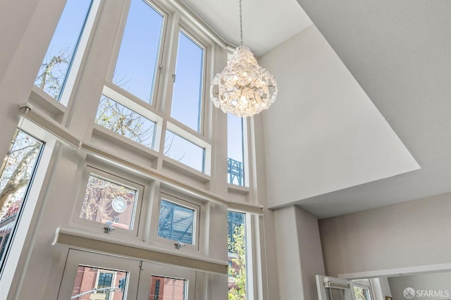 88 King St Unit 104, San Francisco, CA 94107 - room details with an inviting chandelier