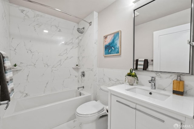 88 King St Unit 104, San Francisco, CA 94107 - full bathroom with marble finish floor, vanity, toilet, shower / bathing tub combination, and tile walls