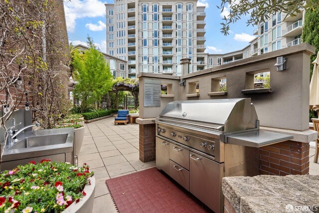 88 King St Unit 104, San Francisco, CA 94107 - view of patio featuring an outdoor kitchen and a sink