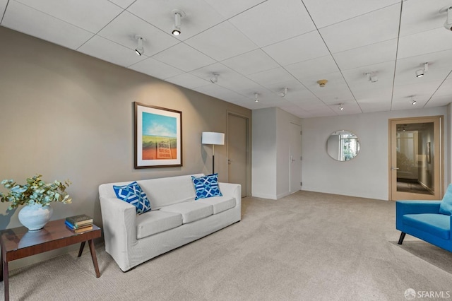 88 King St Unit 104, San Francisco, CA 94107 - living area with light carpet, baseboards, and a drop ceiling