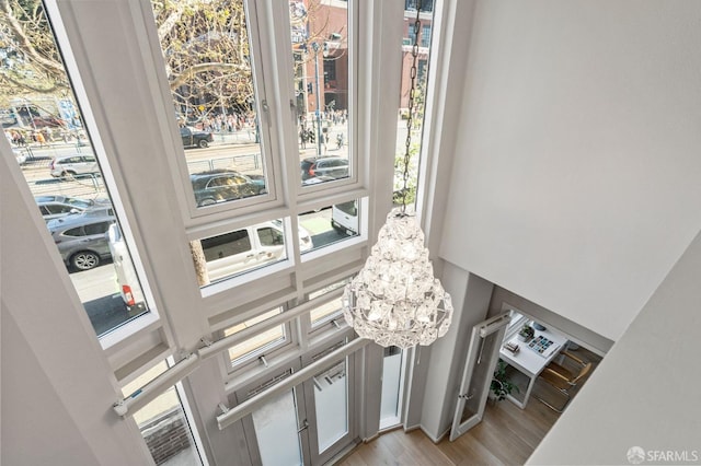 88 King St Unit 104, San Francisco, CA 94107 - room details featuring a notable chandelier and wood finished floors
