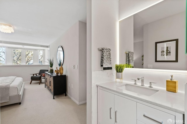 88 King St Unit 104, San Francisco, CA 94107 - ensuite bathroom with vanity, baseboards, and ensuite bath