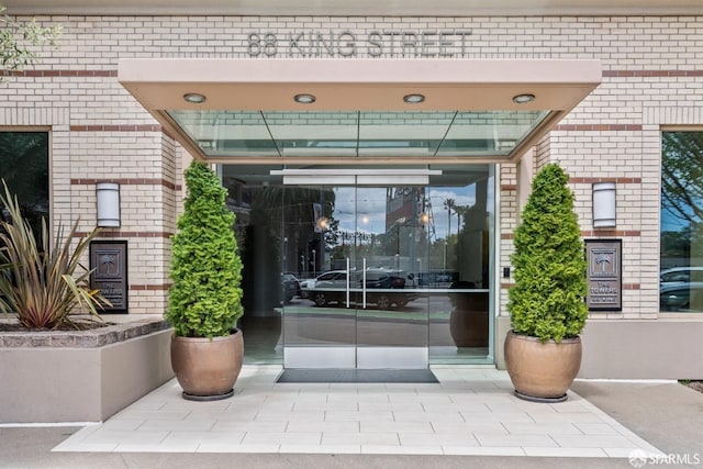 88 King St Unit 104, San Francisco, CA 94107 - view of exterior entry featuring brick siding