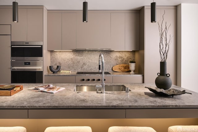 kitchen with double oven, modern cabinets, decorative backsplash, and gray cabinetry