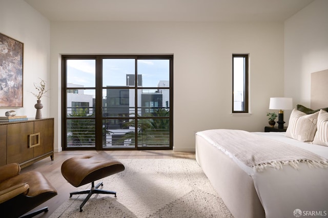 bedroom with light wood-type flooring