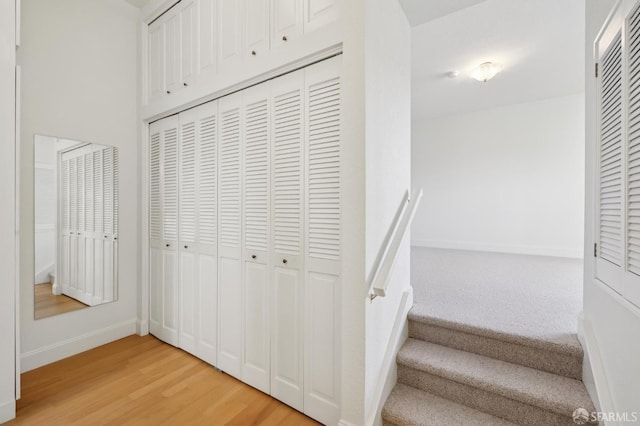 1695 Sutter St, San Francisco, CA 94109 - stairs with wood finished floors and baseboards