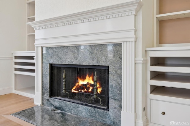 1695 Sutter St, San Francisco, CA 94109 - detailed view of a high end fireplace and wood finished floors