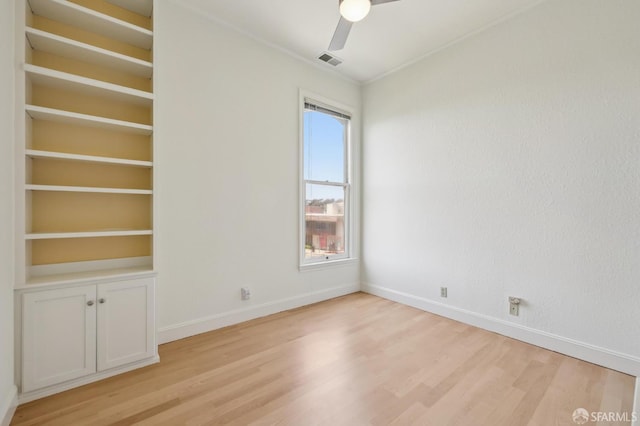 1695 Sutter St, San Francisco, CA 94109 - unfurnished room featuring light wood-type flooring, a ceiling fan, and ornamental molding