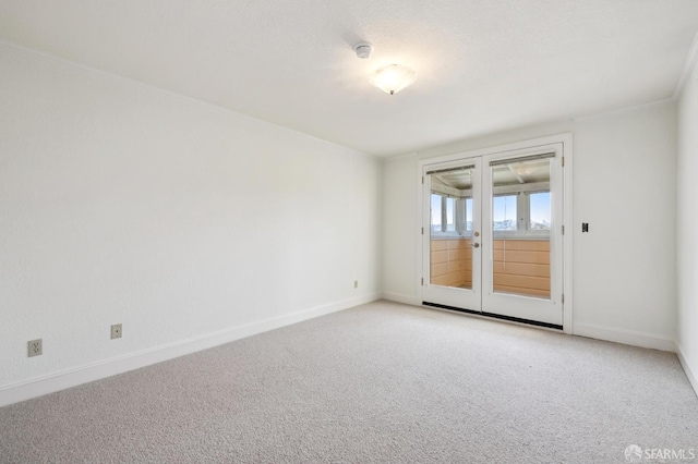 1695 Sutter St, San Francisco, CA 94109 - empty room with french doors, light carpet, and a smoke detector