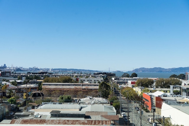 birds eye view of property with a mountain view