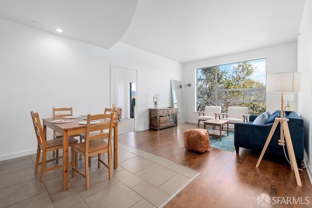 dining space featuring hardwood / wood-style floors