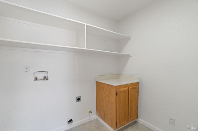 laundry room with washer hookup, light tile patterned floors, hookup for an electric dryer, and gas dryer hookup