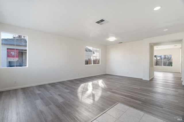 empty room featuring hardwood / wood-style flooring