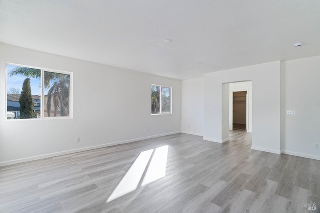 unfurnished room featuring light hardwood / wood-style flooring