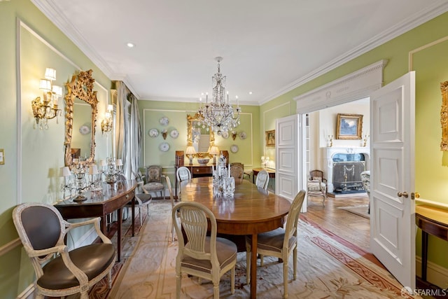 dining space featuring an inviting chandelier, light hardwood / wood-style flooring, and ornamental molding