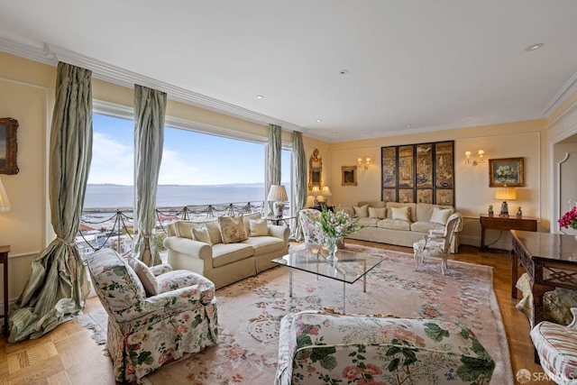 living room featuring crown molding, a water view, and light parquet flooring