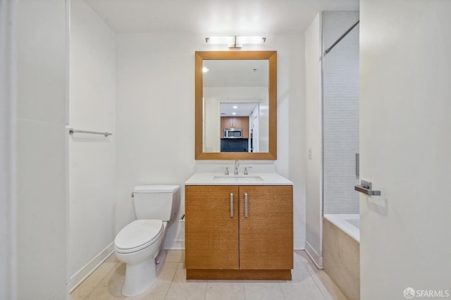 full bathroom with vanity, tiled shower / bath combo, toilet, and tile patterned floors