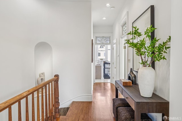 3364 21st St, San Francisco, CA 94110 - corridor with wood finished floors, recessed lighting, and an upstairs landing