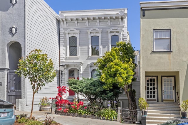 3364 21st St, San Francisco, CA 94110 - view of front of home with entry steps and stucco siding