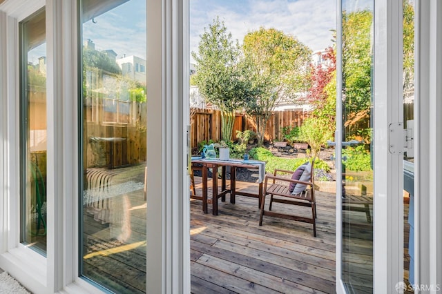 doorway to outside featuring hardwood / wood-style floors