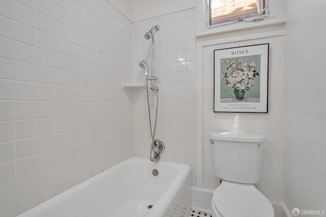 bathroom featuring toilet and shower / bathtub combination