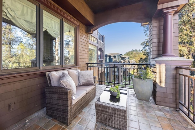 balcony with an outdoor hangout area