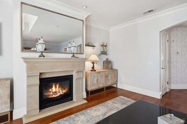 interior space with hardwood / wood-style flooring and crown molding