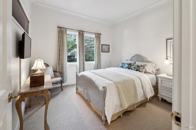 carpeted bedroom with crown molding