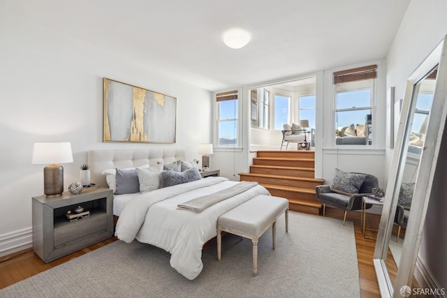 bedroom featuring hardwood / wood-style floors