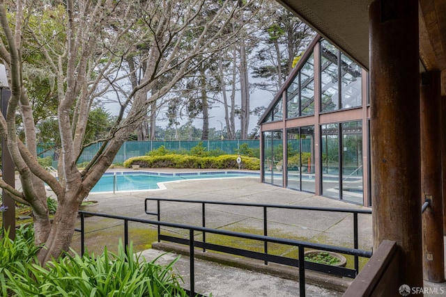 view of swimming pool featuring a patio