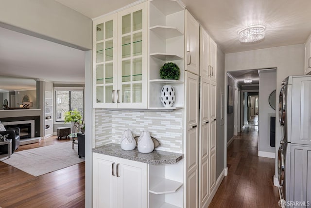 hallway featuring dark hardwood / wood-style flooring