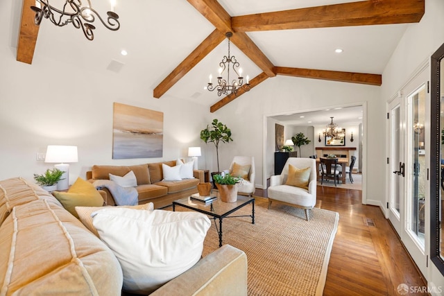 living room with a chandelier, vaulted ceiling with beams, recessed lighting, wood finished floors, and plenty of natural light