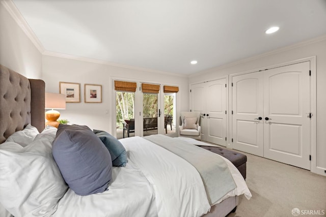 bedroom with recessed lighting, light colored carpet, access to exterior, two closets, and crown molding