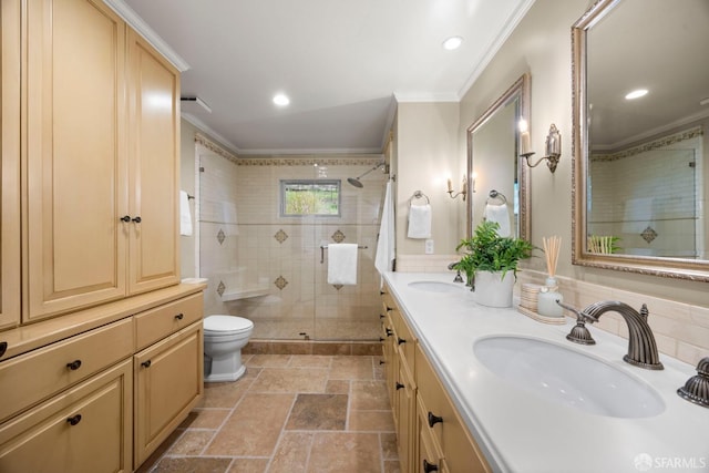 full bath with ornamental molding, a sink, a shower stall, and double vanity