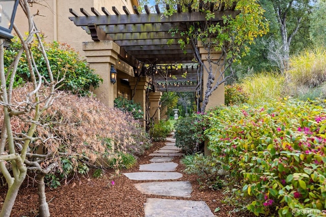 exterior space featuring a pergola