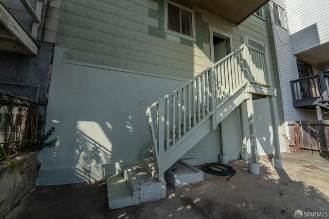 262 Topeka Ave, San Francisco, CA 94124 - view of side of home featuring stairs and fence