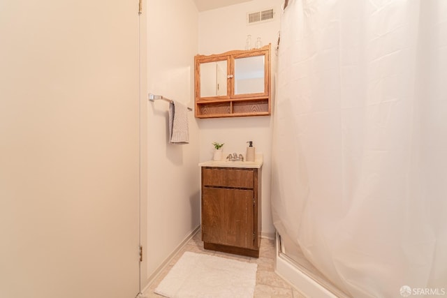 262 Topeka Ave, San Francisco, CA 94124 - full bath with a shower stall, vanity, and baseboards