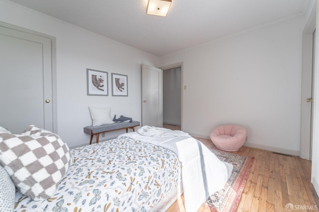 262 Topeka Ave, San Francisco, CA 94124 - bedroom with light wood-style flooring and baseboards