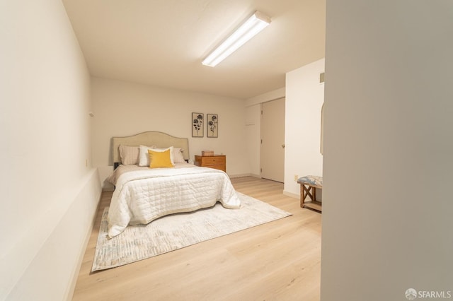 262 Topeka Ave, San Francisco, CA 94124 - bedroom with light wood-style floors and baseboards