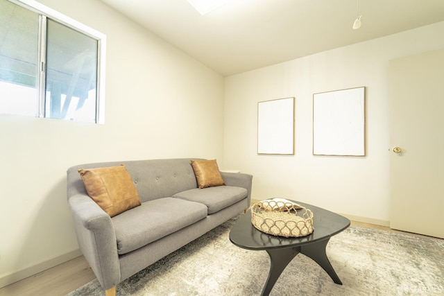 262 Topeka Ave, San Francisco, CA 94124 - living room featuring baseboards and wood finished floors