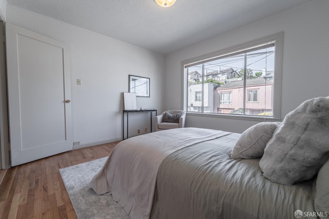 262 Topeka Ave, San Francisco, CA 94124 - bedroom with wood finished floors and baseboards