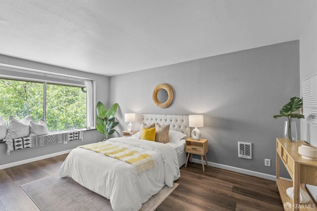 388 Imperial Way Unit 2, Daly City, CA 94015 - bedroom featuring baseboards, heating unit, and wood finished floors