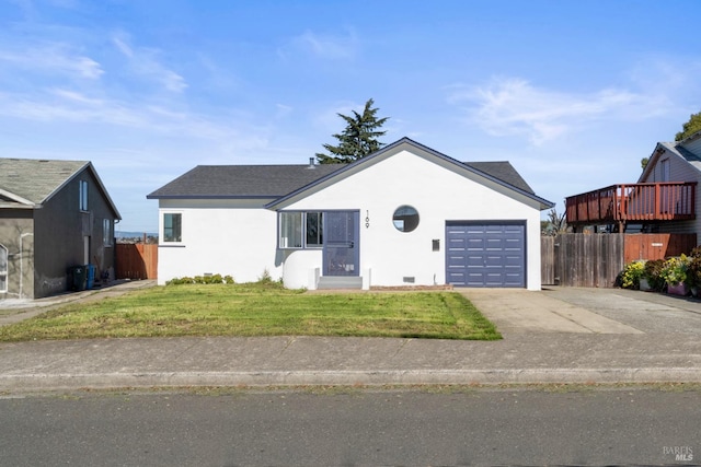 ranch-style house with stucco siding, fence, a garage, driveway, and a front lawn