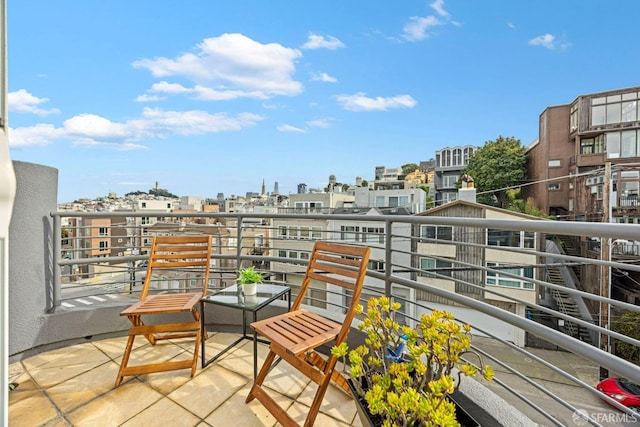 balcony featuring a view of city