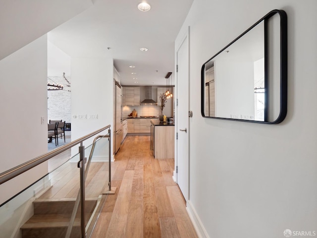 hallway featuring light hardwood / wood-style flooring