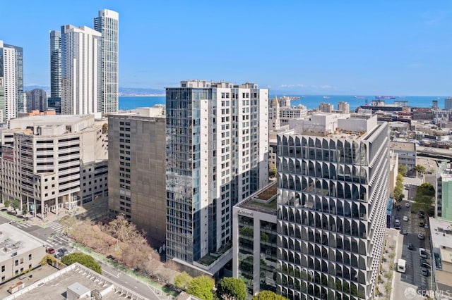 property's view of city featuring a water view