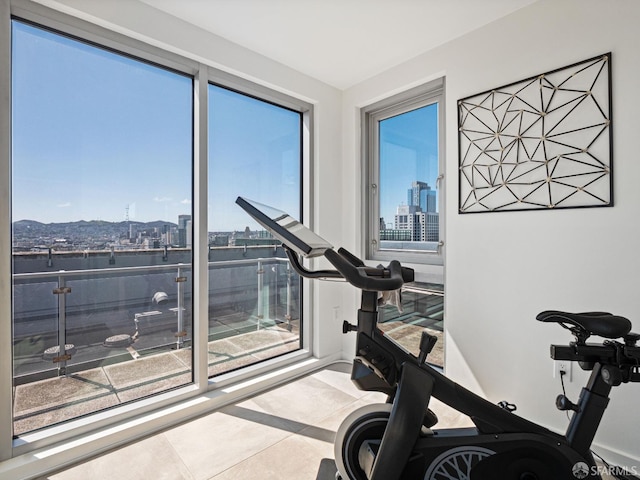 workout room featuring tile patterned flooring