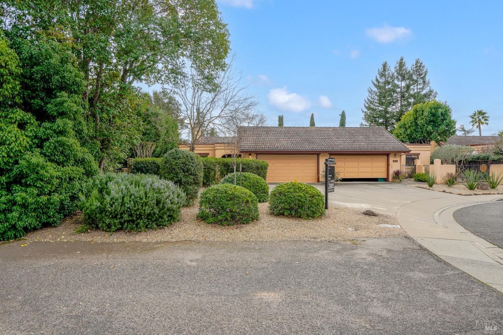 view of front of property featuring a garage