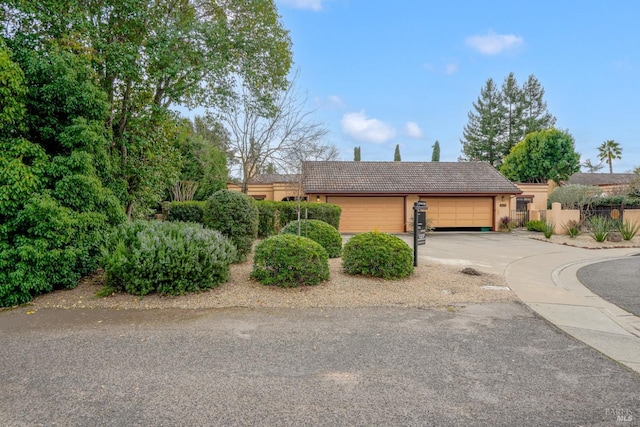 view of front of property featuring a garage